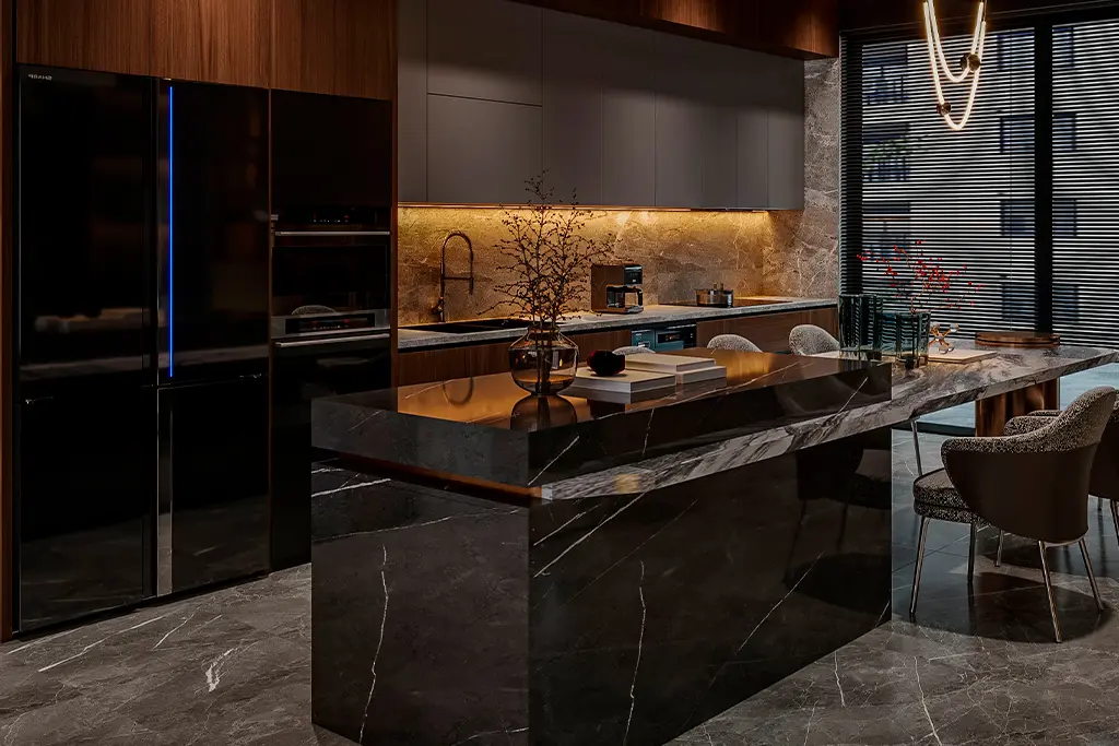 black kitchen with black marble and finishes golden