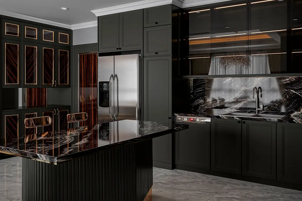 black kitchen with black marble and finishes golden